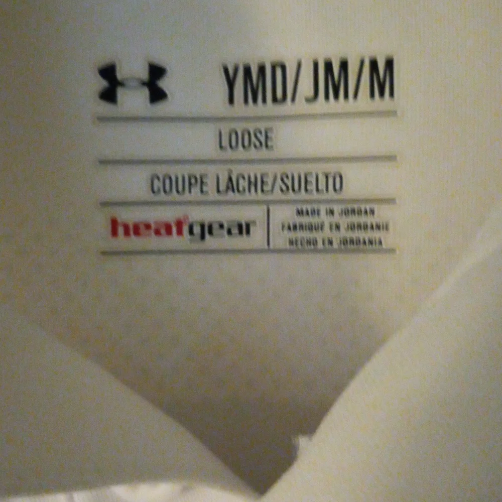 Under Armour heat gear loose knit top size youth M
